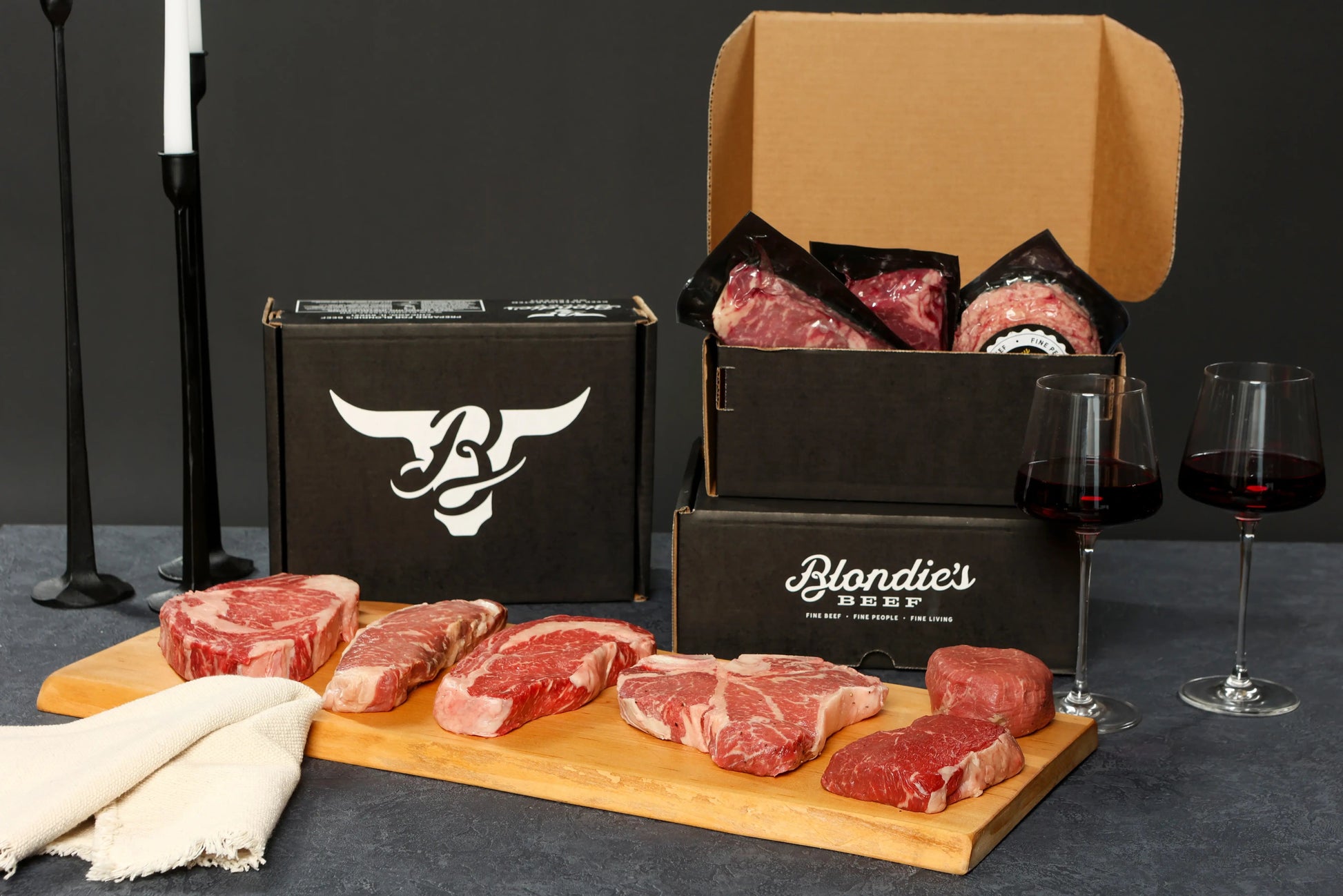 Blondie’s Beef Platinum Level Box with premium American Wagyu steaks, wine glasses, and elegant presentation.